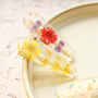 Pulseras de flores secas con pinzas para el pelo a juego