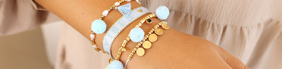 Colgante pomp&oacute;n & abalorios